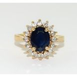 14ct gold Princess Diana style Sapphire and Diamond cluster ring size N
