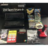 ZX SPECTRUM + PERSONAL COMPUTER AND GAMES. Here with original box we find this small spectrum pc