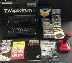 ZX SPECTRUM + PERSONAL COMPUTER AND GAMES. Here with original box we find this small spectrum pc