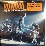 NIRVANA ‎’LIVE AT THE PARAMOUNT’ ORANGE VINYL ALBUM. Nirvana’s live performance at the Paramount