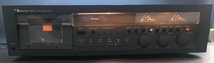 NAKAMICHI CASSETTE DECK. 2 head cassette deck Model No. 580M. Powers up when plugged in.