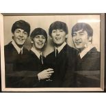 SIGNED BEATLES FRAMED BLACK AND WHITE PHOTO.