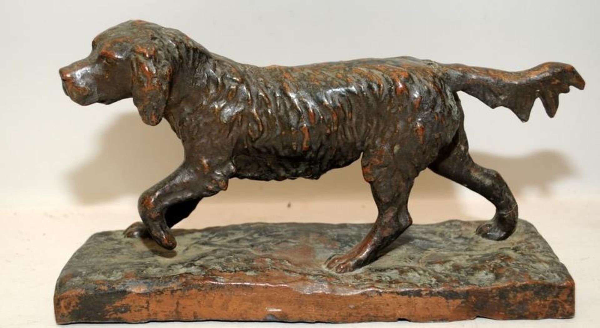 Antique large bronze figure of a hunting dog. O/all 27cms across base. Would originally have been