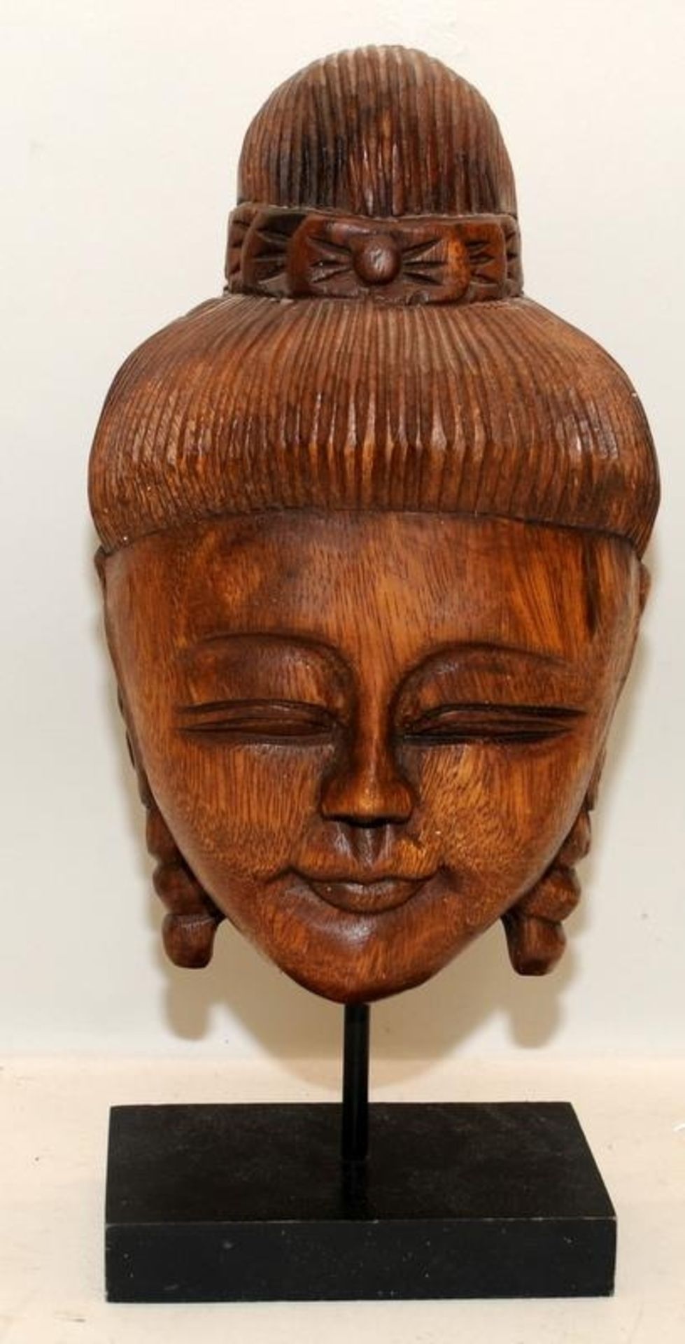 Vintage fine carved Buddha head bust mounted on wooden plinth. 36cms tall