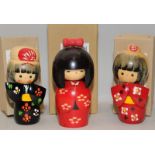 Japanese Kokeshi wooden dolls with boxes. Three in lot