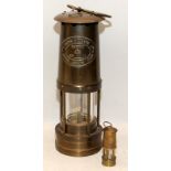 E Thomas & Williams Aberdare brass miners lamp c/w a vintage miniature example
