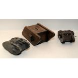 Three scratch built wooden money boxes in the form of WWI tanks the largest being 32cms across