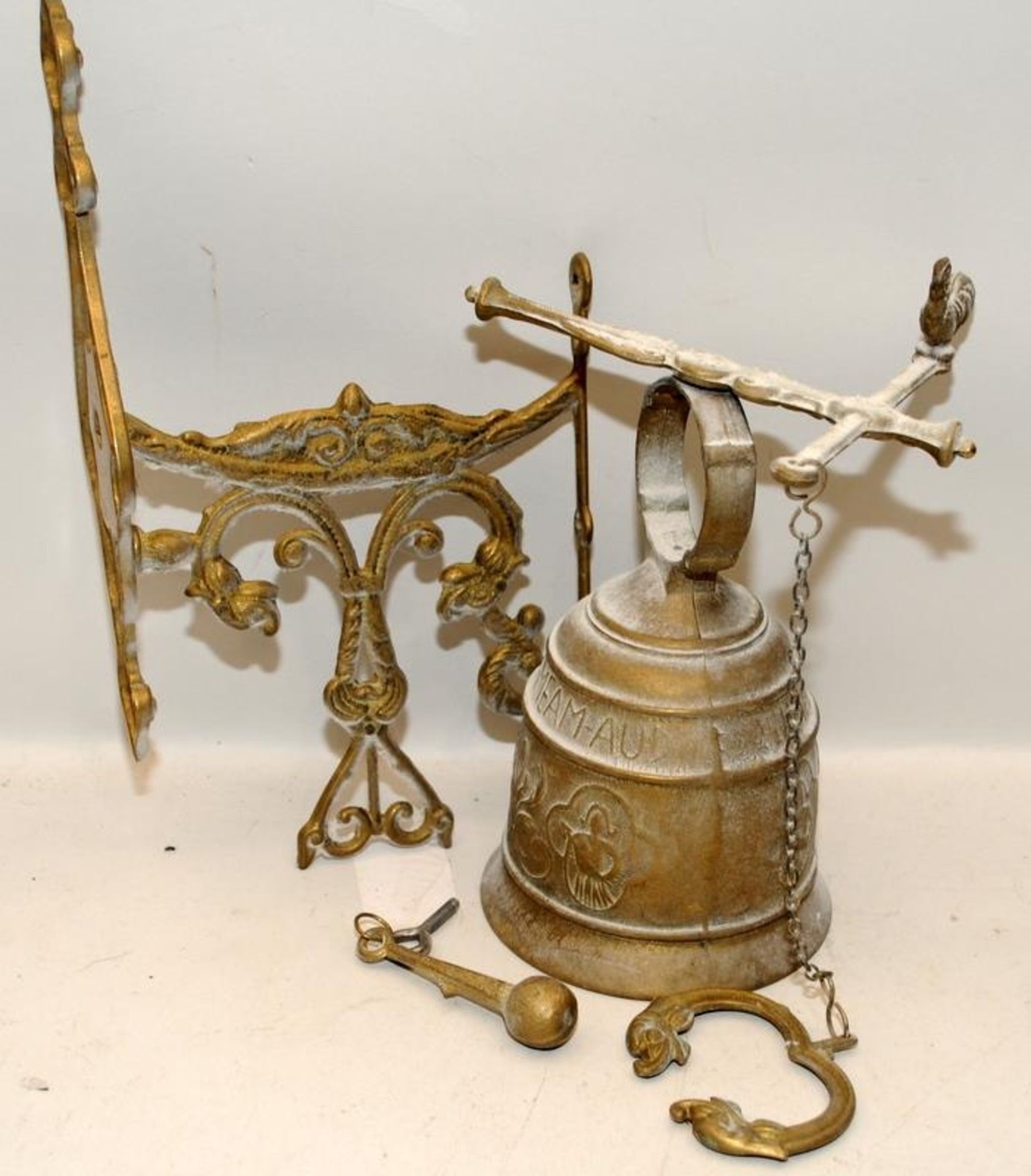 Vintage brass bell with wall bracket