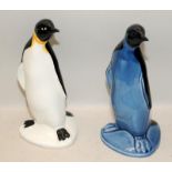 Pair of Poole Pottery large Penguins, one white and one blue. 23cms tall