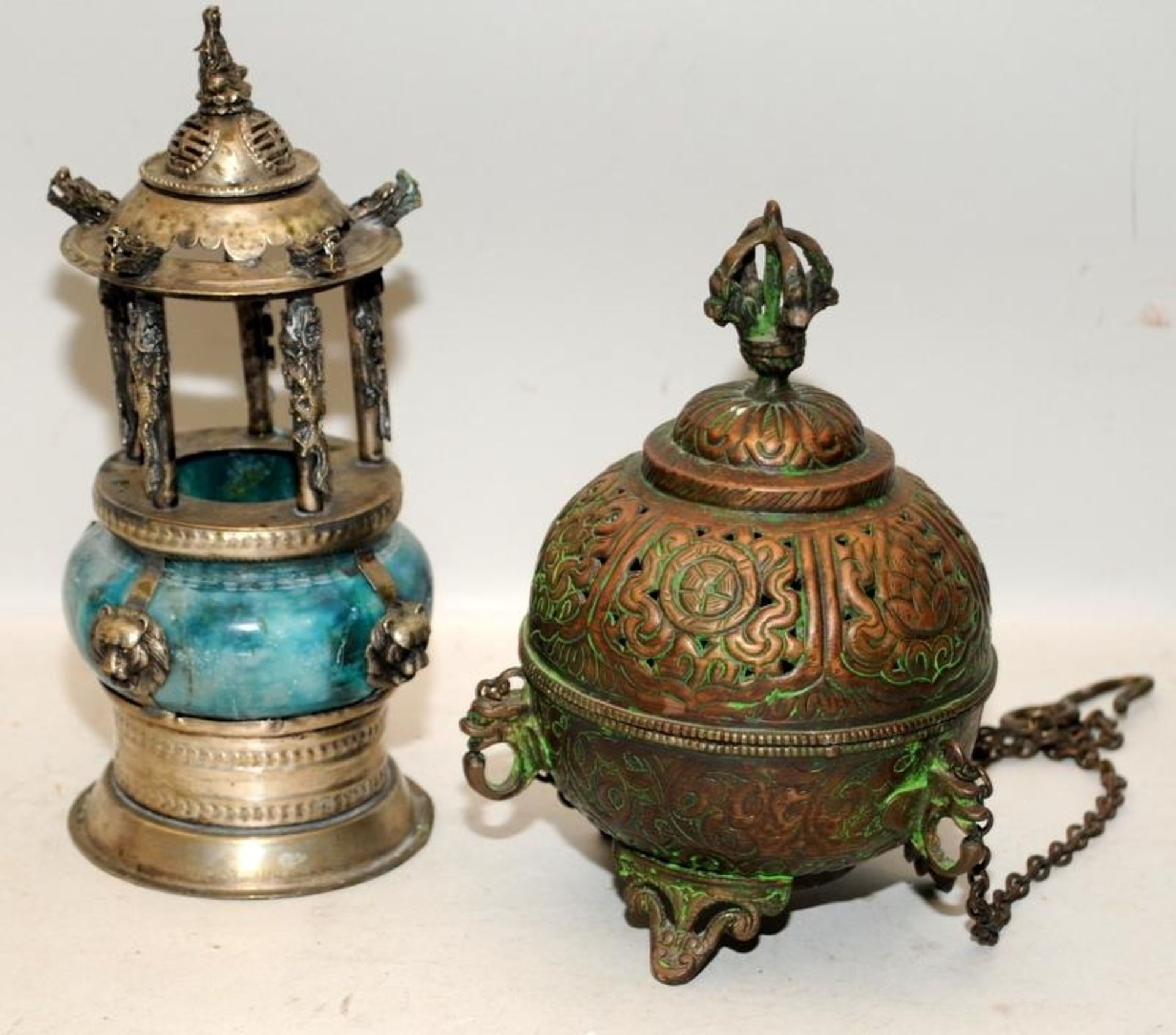 Two antique incense burners, one possibly Tibetan of brass construction and one Chinese of stone/