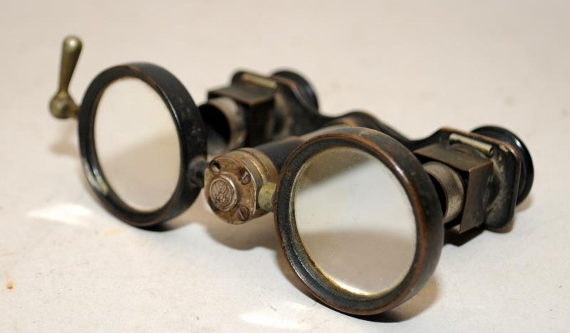 Three pairs of vintage binoculars to include WWI L Petit with crows foot stamp, Le Jockey Club Paris - Image 6 of 7