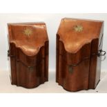 Pair of George III knife boxes in serpentine form, each with an inlaid star. Hinged tops with fitted