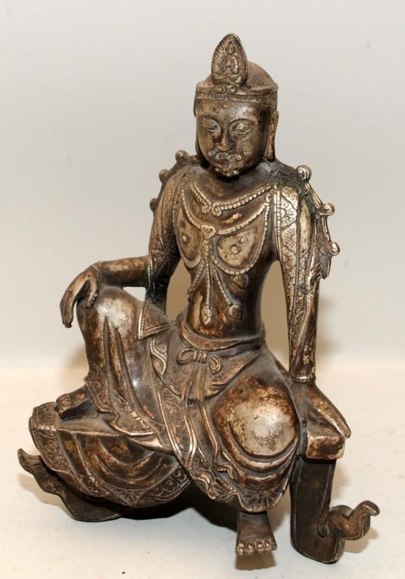 Vintage cast metal seated Tibetan Buddhist figure 24cms tall