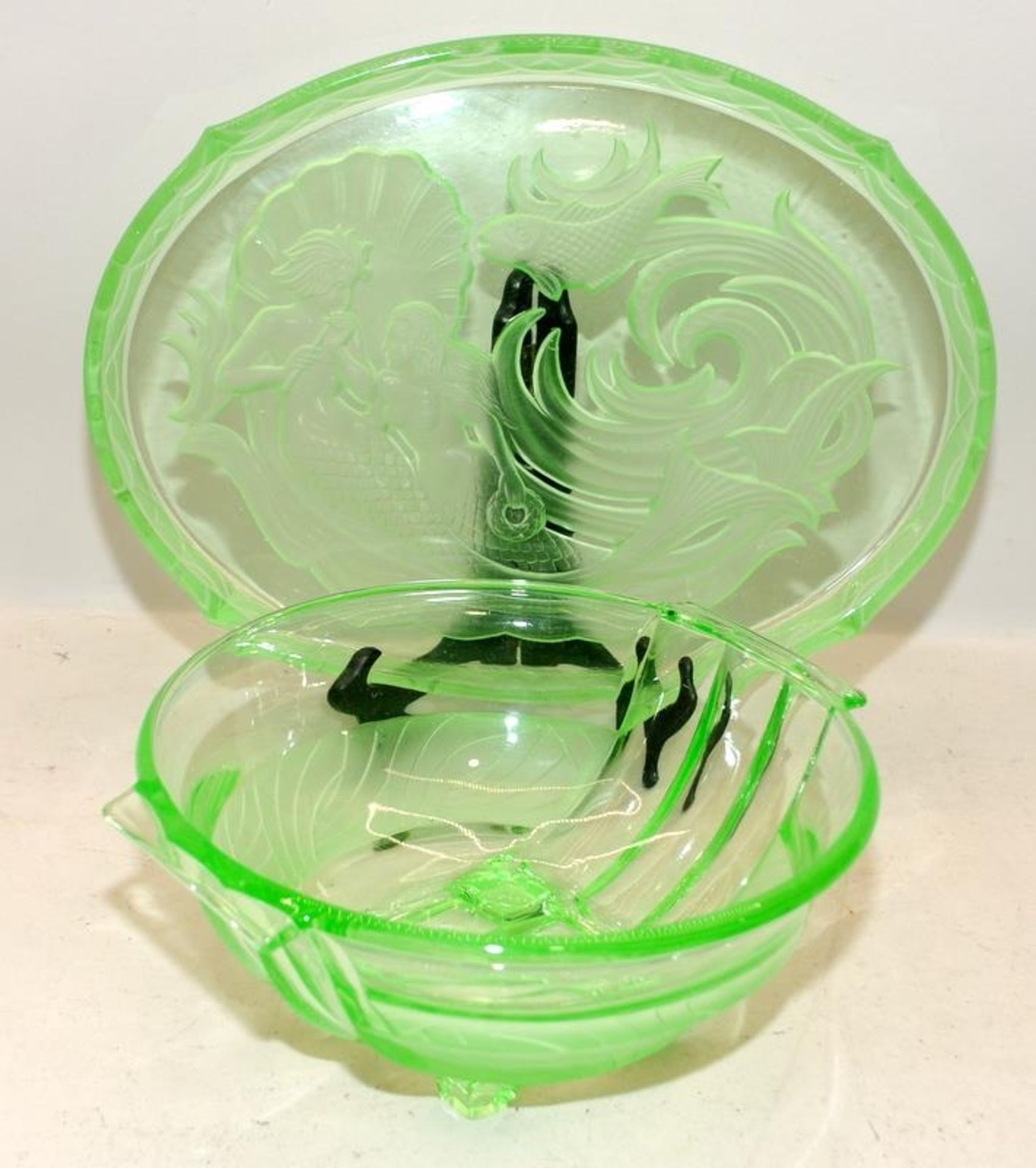 Uranium glass Art Deco dressing table tray c/w a Uranium glass fruit bowl. Tray 35.5cms across, bowl