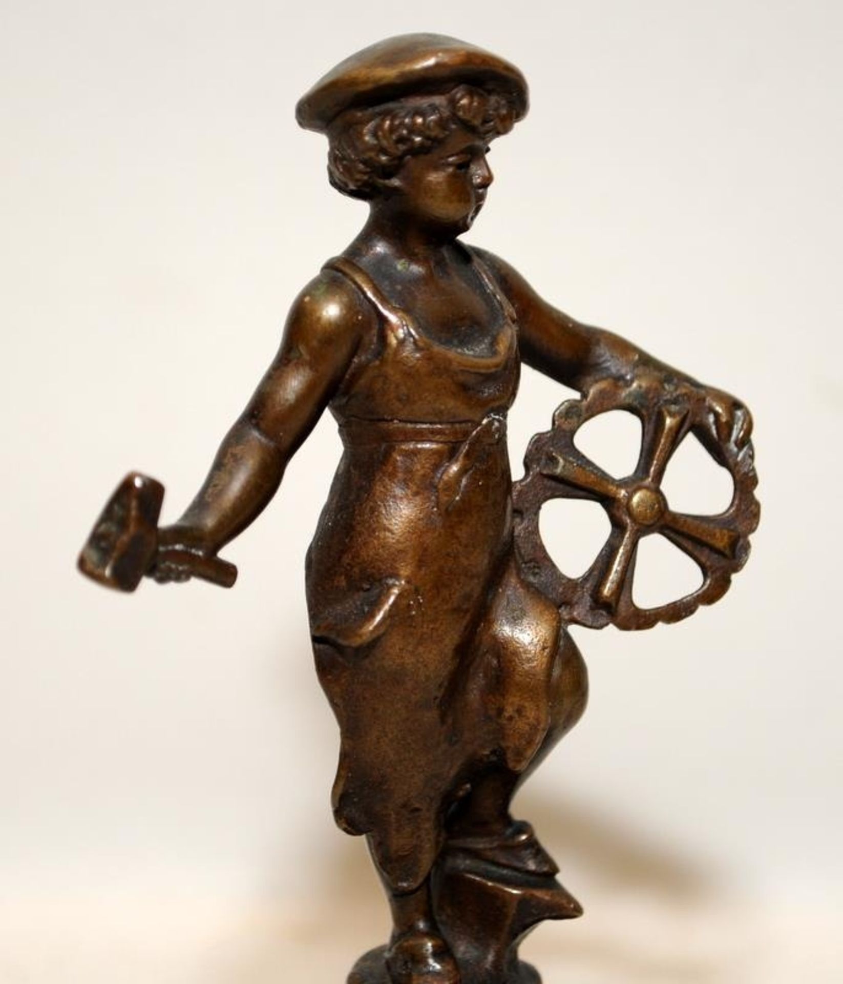 In the manner of Victor Seifert: Small bronze on stepped pedestal of a young girl blacksmith. - Image 2 of 4