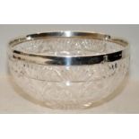 Edwardian large cut glass salad or fruit bowl with hallmarked silver collar. Hallmarked for London