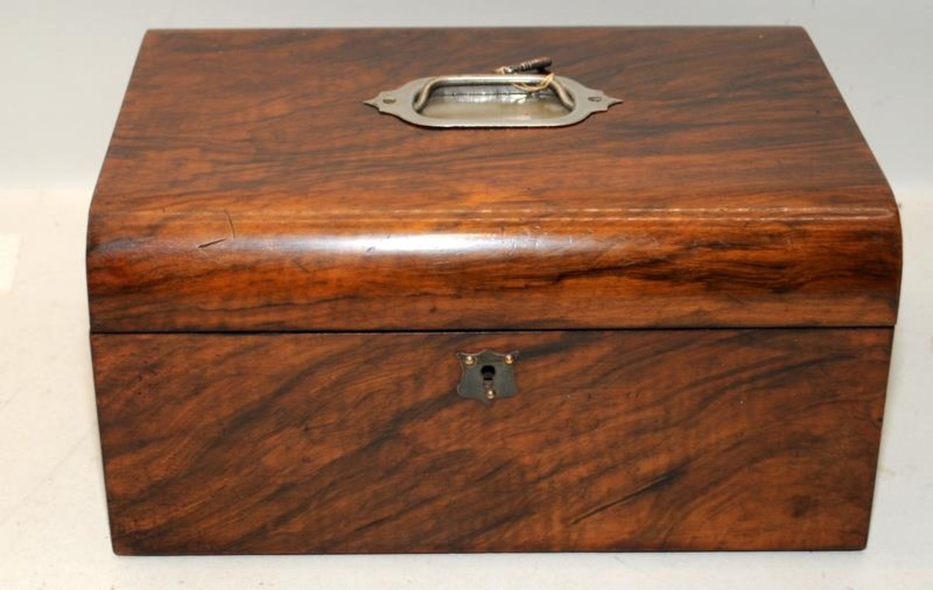 Victorian silk lined rosewood jewellery box with fitted compartments and key. 30cms across x 15cms