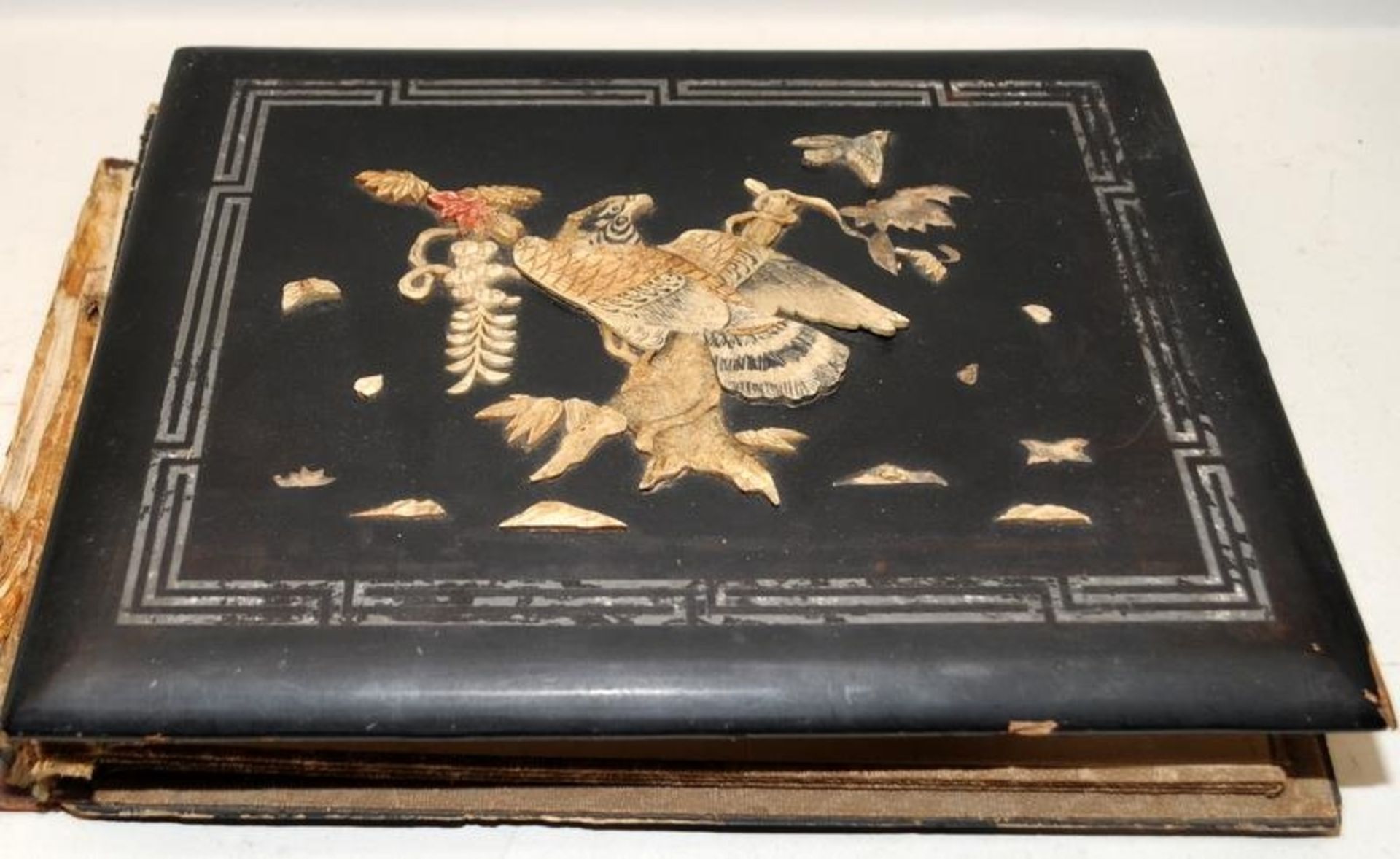 Antique Japanese postcard album with lacquered boards and inlaid decoration to front (some losses