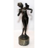 Bronze study of a female nude with a cockatoo on her upper arm on a marble base. Signed H Keck.