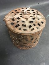 A small pierced iron box. (172)