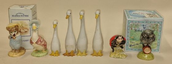 Collection of boxed and unboxed porcelain figurines to include Royal Doulton Winnie the Pooh owl and