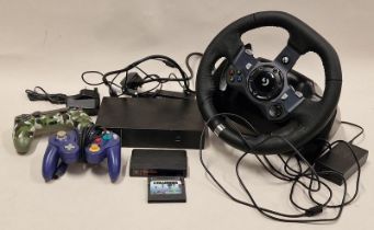 Miscellaneous gaming gear to include steering wheel, controllers, leads etc. This lot has not been