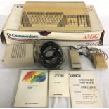 COMMODORE AMIGA 500 COMPUTER. Vintage computer here complete with original box - Power supply,