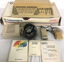 COMMODORE AMIGA 500 COMPUTER. Vintage computer here complete with original box - Power supply,