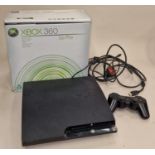 Xbox 360 Go Pro boxed console together with a Sony PS3 slim console. Includes some leads and