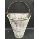 A bucket wall planter (194)