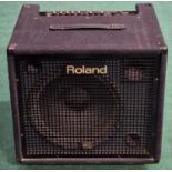 Roland KC-550 large guitar amplifier.