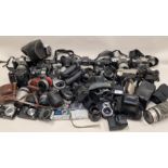 Very large collection of vintage cameras, lenses and other ancillary items.