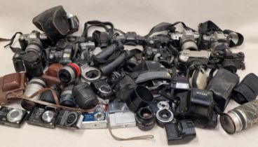 Very large collection of vintage cameras, lenses and other ancillary items.