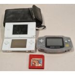 Nintendo Game Boy Advance together with a Nintendo DS Lite, Pokemon game cartridge and carry case.