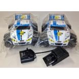 Nikko R/C Vaporizer 2 pair of cars with a remote and battery charger.