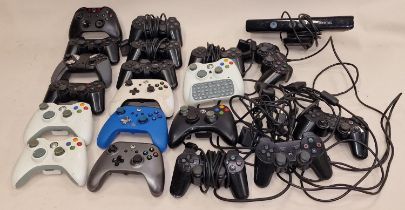 Collection of game console controllers to include PlayStation and Xbox examples. Wired and wireless.