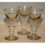 Three matching Georgian / Victorian Illusion toasting glasses. 11.5cms tall