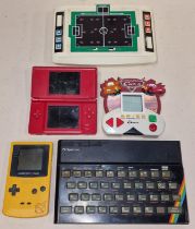 Collection of handheld gaming items to include Nintendo DS Lite, Game Boy Colour, Sinclair ZX