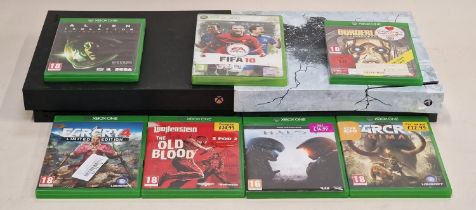 Two Xbox One consoles together with 7 boxed games. This lot has not been tested.