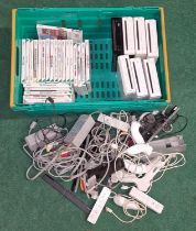 Nintendo Wii collection of 7 consoles together with a large assortment of games, leads and