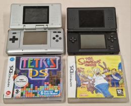 Nintendo DS console together with a Nintendo DS Lite console and two boxed game cartridges. This lot