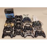 Collection of game console controllers from various systems to include Xbox and PlayStation. 19 in