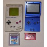 Handheld gaming: Nintendo Game Boy together with a Nintendo Game Boy Advance SP and two game