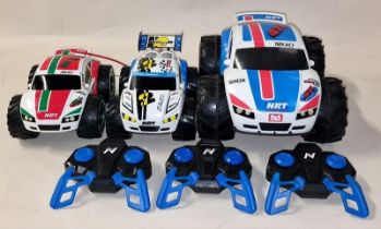 Nikko group of unboxed radio controlled cars all with controllers (3).