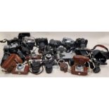 Very large collection of vintage cameras, lenses and other ancillary items.