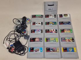 Super Nintendo Entertainment System collection of 15 game cartridges to include Mario examples