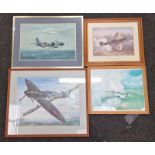 Collection of framed and glazed military aircraft prints.