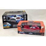 Nikko radio control vaporizr boxed car together with a boxed Extreme Machines SRT Viper car (2).