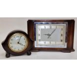 Two vintage oak cased Smiths mantle clocks.