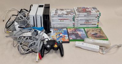 Collection of mainly Nintendo Wii related gaming items to include three consoles, large collection